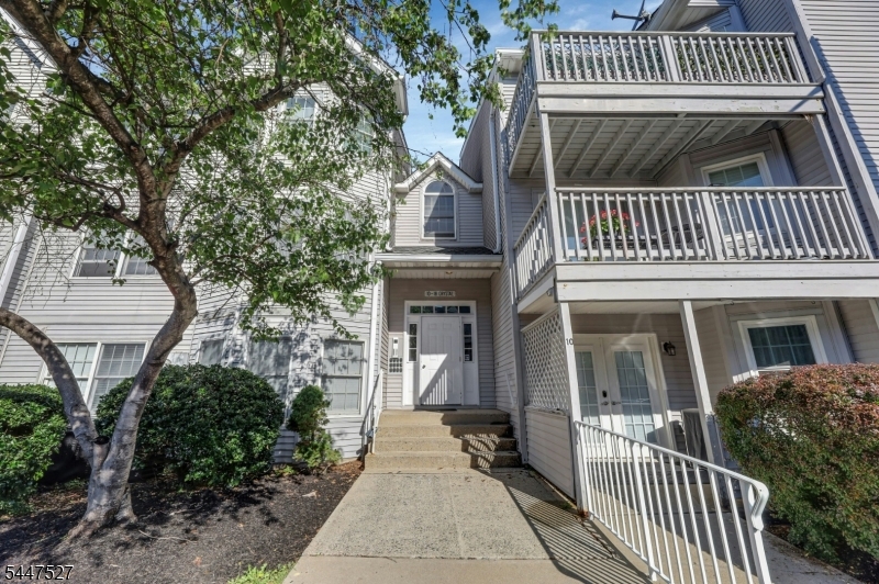 Welcome to 15 Crystal Lane in the Garret Heights community! This unit with an open floor plan and breathtaking unobstructed views features 2 spacious bedrooms, 2 full baths, living room with wood burning fireplace, laundry room, and a dining room. The primary bedroom offers a full bath, 2 closets, and the 2nd bedroom has a walk-in closet. From the dining room you can access the sliding glass door leading out to your covered patio showcasing stunning mountain views day and night. There are also 2 outdoor parking spaces included. Garret Heights, minutes from Garret Mountain Reservation, and other parks is a pet friendly property. It is close to major highways for convenient transportation, shopping, and more. This unit is a must see.
