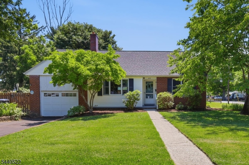 This home is the definition of "don't judge a book by its cover." While it appears to be a modest ranch from the road, inside you'll find almost 2000 sq ft of living space across multiple levels.The main level features the classic flow of a ranch-style home w/a welcoming stone fireplace.Two generous sized bedrooms & a updated bath. The true showstopper awaits through the French doors off the dining room, a family room featuring vaulted ceilings, exposed wood beams, solar-powered skylights with built-in blinds, and a powder room. From the living room, a staircase leads to a cozy 2nd floor den complete w/built-in seating. Just a few steps beyond, you'll find a spacious primary suite retreat featuring vaulted ceilings, a loft-style sitting area overlooking the family room below, solar-powered skylights, a deep closet, and additional storage space. Back downstairs, the kitchen provides access to the attached one-car garage, which includes a convenient rear door leading directly to the backyard. A large basement offers abundant storage, workshop space, and/or hobby area. Outside, enjoy a level and usable .32-acre corner lot featuring a patio area, storage shed, and privacy fencing with double-gate access, perfect for pets, play, gardening, or entertaining. Just around the corner from BHS & within easy walking distance to local shops, restaurants, parks, and community events, this home offers the perfect blend of small-town charm and everyday convenience.