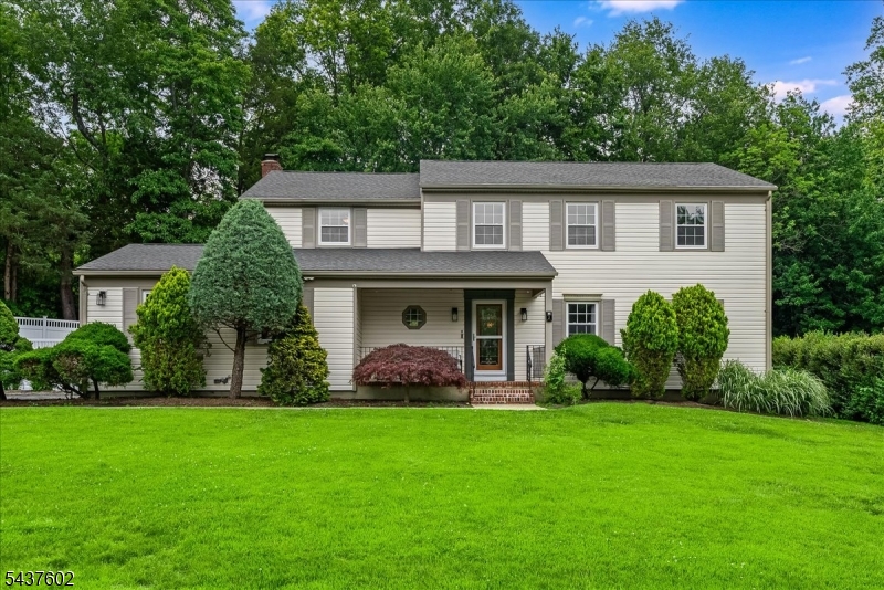 Welcome home to this stunning turn-key Colonial. Nestled on a quiet cul-de-sac just minutes from town, the Community Park & Pool, and Midtown Direct train access, this beautifully appointed 5-bedroom, 2.5-bath Colonial checks every box and then some. Step inside to gleaming hardwood floors that flow seamlessly across both levels, setting the tone for the warm, refined interiors throughout. The heart of the home is a brand-new kitchen anchored by a large center island ideal for morning coffee, casual entertaining, or everything in between. The kitchen opens naturally to the family room, which spills out to a private backyard retreat complete with a patio, deck, fire-pit, electric awning and fully fenced-in yard. The thoughtfully designed first floor also features a formal living room, dining room, powder room, and a dedicated mudroom to keep daily life organized and effortless. Upstairs, five well-sized bedrooms and two full baths including a luxurious primary suite with walk-in closet, dressing area, and ensuite bath. A conveniently located second-floor laundry room makes everyday living easy. Downstairs, the spacious finished basement adapts to your lifestyle with a walk in dedicated pantry and whatever you can you envision: a rec-room, game room, home gym, or all three. A 2-car garage rounds out this truly complete package. A full smart home, new roof and new driveway are just an added bonus!(Ping pong table, firepit and furniture, playset, cameras and blink doorbell incl.)