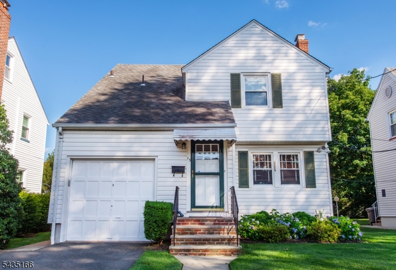 Classic Charm with Modern Comfort. This charming Colonial is tucked away on a quiet dead-end street in a sought-after residential neighborhood! Centrally located close to shops, highways, NY transportation, and schools, this home offers the perfect blend of charm and modern updates. Step into the inviting formal living room featuring a cozy gas fireplace, perfect for relaxing evenings. Formal dining room is ideal for gatherings and entertaining. Eat-in kitchen offers stainless steel appliances and great space for everyday dining. Extended room on the main level, currently used as a den, offers flexibility as a home office or bonus space. Relax and take in the sunlight in the Florida Room, the perfect place to unwind with your morning coffee or enjoy peaceful moments. Half bathroom completes the first floor. Ascend to the second level where you will find a sizeable primary bedroom with walk-in closet, two additional bedrooms, and an updated full bathroom featuring a tub and separate stall shower. Partially finished full basement provides added space. Enjoy easy lawn care with underground sprinklers. Additional highlights include gleaming hardwood floors, newer central AC, updated 200-amp electric panel, tilt-in vinyl replacement windows, attic storage, driveway for off-street parking, and garage with automatic opener. A Must See!