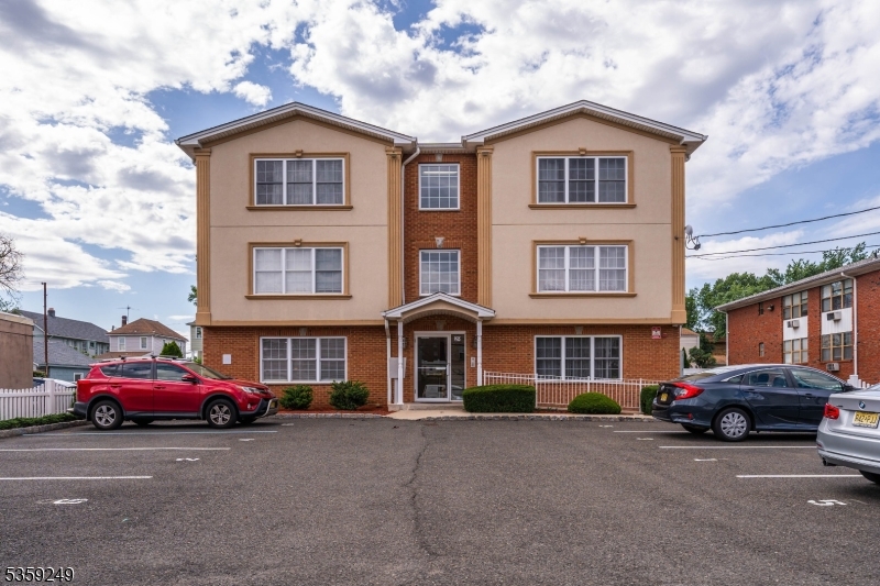 Discover comfort, convenience, and modern living in this spacious ground floor condo, built in 2010 and ideally located in the heart of Linden. This well-maintained unit features a bright and airy living and dining room combo with large windows that fill the space with natural light. The spacious kitchen offers granite countertops, abundant cabinet space, and a layout perfect for both everyday living and entertaining. The condo includes two generously sized bedrooms, including a primary suite with a full private bath and walk-in closet, as well as an additional full bathroom located off the hallway. You'll also enjoy the convenience of in-unit laundry, brand new flooring throughout, central heating and air conditioning, and a utility closet for extra storage. Newer furnace and water heater. The unit is wheelchair accessible and includes two assigned parking spots. Additional features include a private storage unit in the basement and access to a shared laundry room in the building. Just three blocks from the train and half a block from Downtown Linden's shops and restaurants, this home offers unmatched convenience in a prime location. This is a must-see opportunity schedule your private tour today!