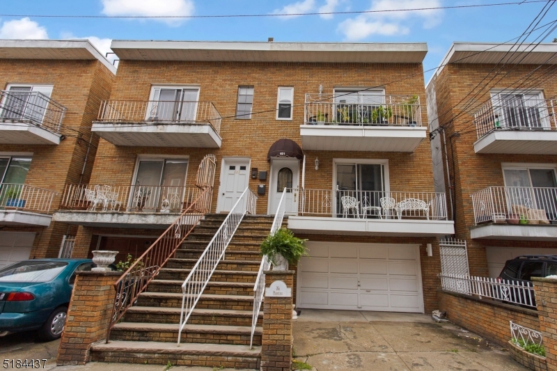 Here is your opportunity to own a Spacious Multi-family home in MOVE IN CONDITION. Located just 3 blocks from Washington St & just mins walk to the PATH. Not only is the Location GREAT but so is the home! This home has OFF STREET PARKING with your own GARAGE! The Garden level  "Level 1  (currently owner occupied will be delivered vacant) has 1 bedroom, kitchen, Living room, Full Bath, Garage Access, Laundry, Outdoor Living with a fully fenced in back yard. Level 2 and the Garden Level (L1) can be opened to one unit providing a mother/daughter set up with additional living space. Level 2 & Level 3 are similar to each other with 3 bedroom on each floor. Both providing a private balcony, 1.5 baths, Updated Kitchens & Baths. Hardwood flooring on L2 & L3 (under carpets also). Endless Possibilities await for you. This is truly a move in ready property. You are 1 block to the Park with a playground, basketball courts, dog park. Enjoy all Hoboken has to offer with fabulous dining, shopping and the best breathtaking views of NYC. Don't miss this one!