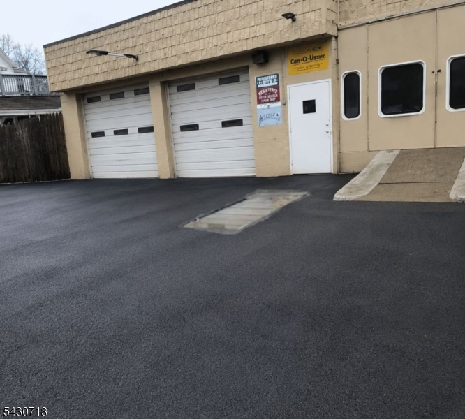 Excellent opportunity to own a commercial property currently operating as a garage/auto body shop. This property offers a functional layout with ample workspace, high ceilings, and convenient access for vehicles. Ideal for mechanics, auto body professionals, or investors looking to expand their business. A turnkey opportunity with strong potential!