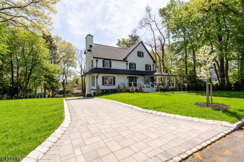 Welcome to this breathtaking brand new, custom, Colonial in one of Montclair's most sought-after communities.Soaring high ceilings and sophisticated designer finishes set the tone from the moment you enter, anchored by the stunning oversized marble gas fireplace- the central focal point of the main, open plan living space- delivering warmth and ambiance at the click of a button.  The designer chef's kitchen features Wolf appliances, Sub-Zero refrigeration and a wine refrigerator making everyday living and entertaining effortless.  Retreat to the magnificent primary suite, complete with its own private fireplace- perfect for cozy evenings in your personal sanctuary.  A coveted rarity in Montclair, the walkout basement, is finished with a dedicated gym and yoga studio, bringing your wellness routine home. The upper level laundry room adds the kind of everyday convenience that truly makes a difference.  Fully equipped as a smart home featuring a hardwired security system and home speaker system through the interior and exterior. Set within Montclair's top rated school district and just minutes from NJ Transit's direct train to New York City.  Vibrant downtown Montclair, renowned for its dining, boutique shopping, parks and art scene is right at your doorstep.  A rare opportunity to own something truly extraordinary.  This is Montclair living at its absolute finest.