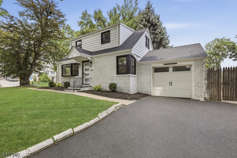 Gorgeous completely renovated colonial. All ne windows, wiring, bathrooms, new epoxy floor in garage, new driveway. Hardwood flooring throughout. Designer kitchen with quartz countertops, designer double oven, all high end stainless appliances.