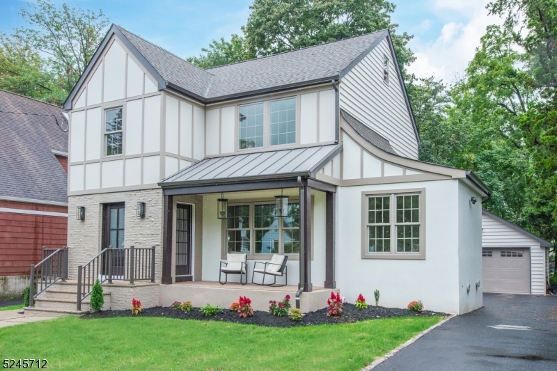 ALL ABOUT THE DETAILS! Discover the epitome of elegance & care free living in this HGTV-design-worthy custom NEW BUILD, right in the heart of Millburn. Every meticulous detail has been carefully curated to create a home that transcends expectations, marrying modern luxury & historic charm. Step inside, you'll be greeted by warm white oak hardwood floors. The chef's kitchen is a masterpiece, w. expansive breakfast bar center island, adorned w. waterfall quartz, illuminated by high-end SS appliances & exquisite gold detailing. Luxury lighting, enchanting chandeliers, & opulent wall coverings make this residence a designer's dream come true. Preserved original arches highlight the timeless character. Open-flow layout & convenient first-floor office offers a serene escape for working from home, ensuring both productivity & tranquility. Upstairs, the master suite awaits, w. private en-suite spa bath & Bluetooth speakers for an immersive experience. Enjoy second-floor laundry room & large guest bedrooms. The fully finished third floor boasts an additional bedroom, providing ample space for guests. Finished basement extends the realm of entertainment or serves as a versatile en-suite, complete w. a full bathroom & den. Even the 2-car detached garage has been pre-wired to charge your EV. NOT in a flood zone. Enjoy the privilege of NJ's best-ranking schools. With close proximity to train, easily access NYC while savoring the tranquility of Millburn's cherished community. Welcome home!