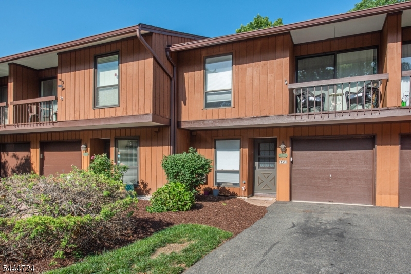 Welcome to Overlook Village! This beautifully maintained, move in ready 2 bedroom, 1.5 bath condo offers a spacious layout, multiple outdoor living areas, and fantastic community amenities. The bright and inviting main level features an open flow between the kitchen, dining area, and living room, creating a comfortable setting for everyday living and entertaining. Both bedrooms offer generous space and natural light. The finished basement provides valuable additional living space complete with a cozy fireplace, perfect for a recreation room, home office, media room, or flexible bonus space. One of the home's standout features is its three separate outdoor spaces, offering plenty of opportunities to enjoy morning coffee, outdoor dining, or simply relaxing. A 1 car garage provides convenient parking and additional storage. Residents of Overlook Village enjoy access to a community pool and tennis courts, adding to the easy, low maintenance lifestyle. Conveniently located and meticulously maintained, this wonderful home is ready for its next owner to move right in and enjoy! Close proximity to NJ Transit, access to major highways like Route 80 and access to shopping, dining and all of Morris County's conveniences.