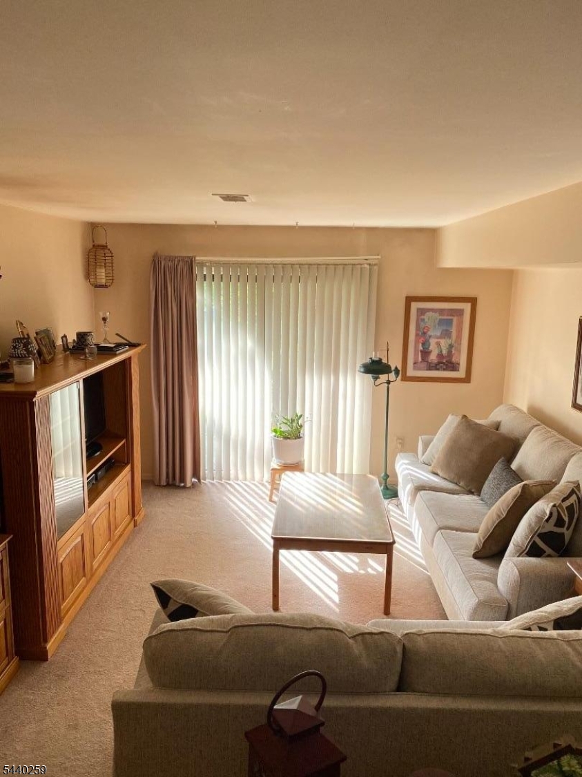 This one bedroom unit is an open floor plan, light and bright with a deck to enjoy your morning coffee. This is an end unit on the first floor in a desirable  community. Newer refrigerator, dishwasher, microwave, washer and dryer are to stay. Convenient to shopping and major roads.