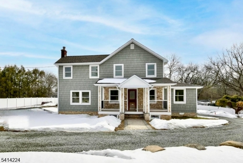 WOW! Awesome 4 bedroom 3.5 Colonial just renovated with nearly 3/4 of an acre of property and a gorgeous custom front porch. This home has a new kitchen with new granite countertops, center island, stainless appliances, sub zero refrigerator, viking gas stove, subway backsplash, vented stainless hood, hardwood floors, large living room with woodburning stove, 2 primary bedrooms with full baths one on each floor, walk -in closet and second floor laundry room, new septic, updated electric, and much more. Seller has plans for a possible detached garage. Property is also zoned C-1 for possible alternative usage. Natural gas & public water has been installed. Seller has plans for a possible detached large garage. A must see!