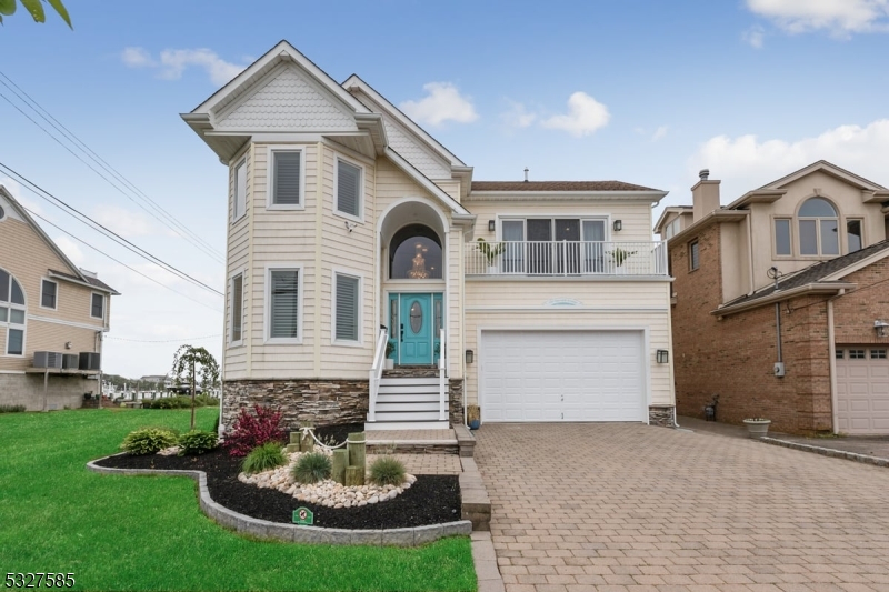 Experience luxury coastal living at this stunning home in Point Pleasant Beach. Designed for comfort and sophistication, this smart-wired property offers breathtaking water views and high-end finishes throughout. The sun-filled, open-concept living and dining area is perfect for entertaining, with panoramic water views. The chef's kitchen features a granite island, BlueStar six-burner stove, double ovens, and a Sub-Zero fridge. A cozy home office, laundry room, and two new hot water heaters complete the first floor. Enjoy one of two fireplaces or unwind in the theater room with an 85-inch TV and reclining seats.The second level includes four spacious bedrooms with hardwood floors, smart TVs, and ample closet space. The primary suite boasts bay windows with water views, a sitting area, and a spa-like en-suite with a soaking tub and pocket-door-enclosed commode. A large full bath and two linen closets provide added convenience. The third level features a guest lounge with a wet bar, mini fridge, balcony with water views, and a billiards table.The professionally landscaped yard includes a smart-wired, heated saltwater pool, outdoor kitchen with multi-tier grill, and boat dock for easy water access. The two-car garage offers ample parking and storage. This exceptional home is a true masterpiece of shore living. Schedule your private tour today!