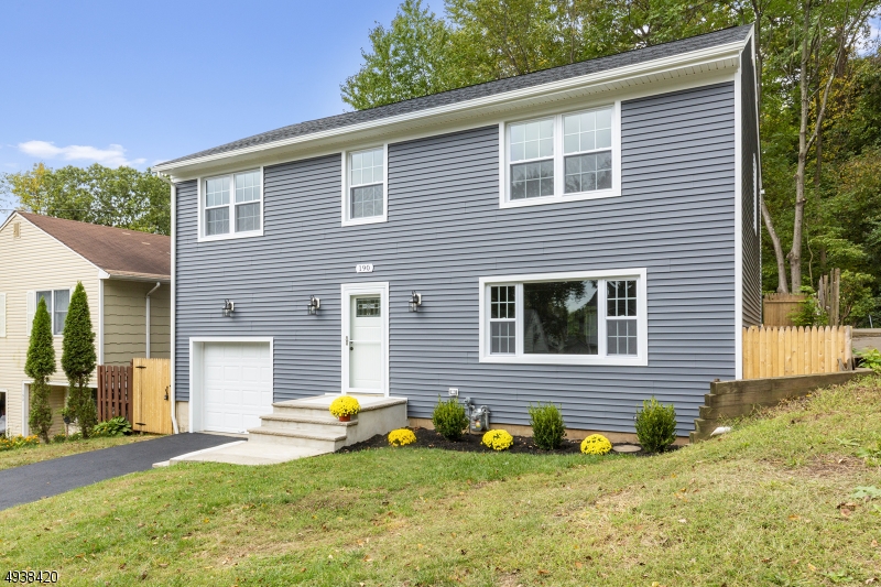 Fully Renovated home in prime location of Scotch Plains NJ! This is the new home you have been waiting for!  Home features an open floor plan, 4 large bedrooms, 3 baths, large living room and new kitchen with MASSIVE Island. The ideal layout and pride in construction the modern home buyer demands. Designer kitchen opens to the large dinning area and adjacent to the living room. with tons of natural light.  Walk out to the maintenance free paver patio and fenced in yard. Fully finished basement, central air, Master Bedroom with ensuite.  A must see!  Everything is brand new and ready to move right in!