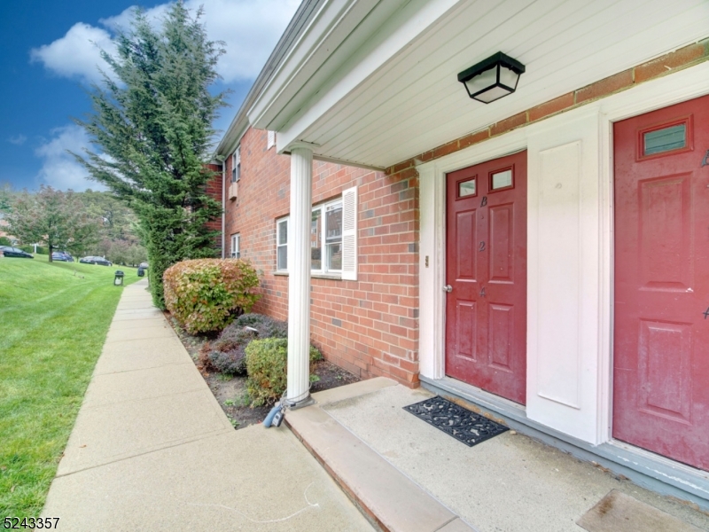 Move-in ready, 1st Floor, 2 Bedroom condo in the Mountain Club! Updated Kitchen with stainless steel appliances and large walk-in Pantry. Updated Bathroom and Shower with Custom Tile. Fully carpeted. A/C units in living room and bedrooms. Assigned Garage Spot Available for Monthly Fee of $40.  Remodeled club house with gym, sauna, pool, tennis courts. Sewer, water, heat, gas, trash, snow removal, exterior maintenance and use of the amenities are included in low monthly dues. Unit has one assigned parking space right behind building and a designated secure storage area in basement as well as coin-operated laundry facilities. The Mountain Club is a commuter's dream--convenient location to NYC trains, highways, shopping, restaurants. As Is sale. Quick closing possible.