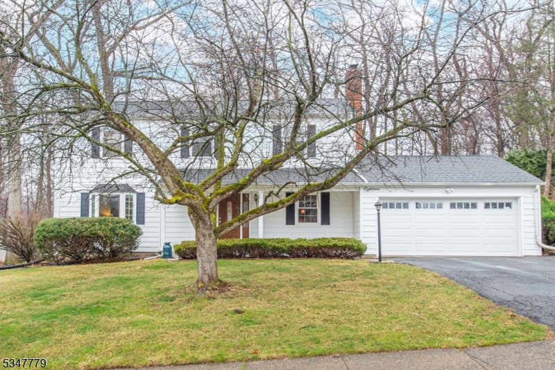 A beautiful home awaits you in Beacon Hill! Offering over 2,200 sqft of living space & an absolutely perfect floorplan. This flowing, classic layout is great for entertaining or everyday living.. Foyer welcomes you in & is bookended by a formal living room & dining room. Both boast large picture windows. Tons of natural light. The kitchen w/ large center island, granite countertops & stainless steel appliances opens to the cozy family room w/ wood burning brick-faced fireplace. Convenient powder room & laundry mudroom offers covered access to the oversized garage. Gorgeous HW flooring. Upstairs 4 generous sized bedrooms & two full baths include a primary suite w/ en-suite & stall shower. Bonus living in the basement w/rec room. Partially unfinished space provides storage along with an attic. Multi-zone heating & cooling. Stunning Backyard Oasis- Perfect for Entertaining & Relaxation! A Private Property with a large Deck & built in benches. Walking distance from NYC-Direct train station, shopping & parks. Enjoy bustling Dwtn Denville or choose to visit historic Mt Tabor w/all its colorful homes, post office, library & LIVE events. Top schools. Shows true pride of ownership. Don't miss it!