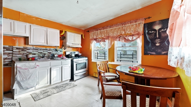 Welcome to 414 Market Street in Paterson, NJ, a two-family home situated in a convenient, city-style neighborhood close to shops, schools, and public transportation. The property offers a total of 4 bedrooms and 3 full bathrooms, with cozy, well-sized units that feature functional layouts and comfortable living spaces. The home would benefit from light updates, offering an excellent opportunity for buyers looking to add their personal touch and enhance value. Ideal for both investors and owner-occupants, this property presents flexibility, potential, and a commuter-friendly location. A great option for those seeking a multi-family home with upside.
