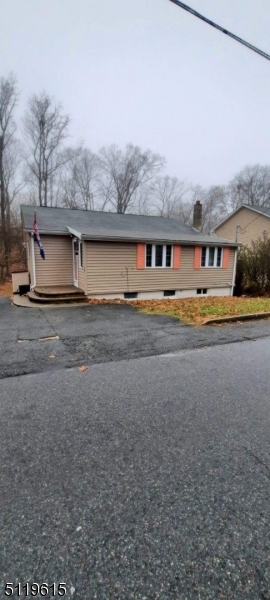 Charming Ranch has lots of living space, lg master BR w/ walk in closet, remodeled eat in kitchen in 2016 w/ big pantry, granite countertops, SS appliances, upstairs bath remodeled 2016, HW floors throughout main level, H/W heater newer, in 2021: new electrical box, new flooring in the downstairs, new downstairs bathroom, new water softener system, new septic being installed! good size backyard, workshop in basement plus large family room and bedroom. 1 YR home warranty included