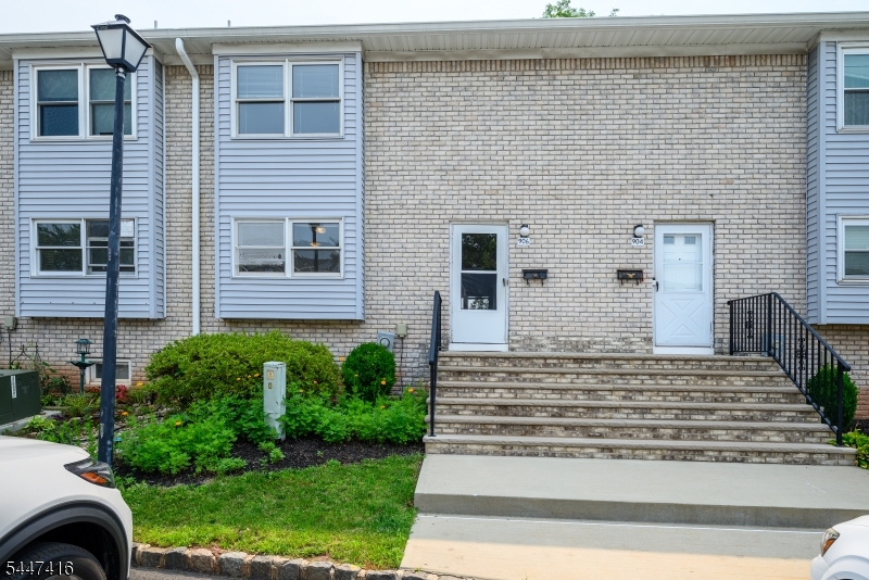 This well-appointed house offers an abundance of living space with two bedrooms and two and a half bathrooms. The brick exterior complements the well-maintained curb appeal. The abundant lighting enhances the neutral decor, providing a warm and inviting atmosphere.The kitchen is designed for functionality, boasting ample cabinetry and tile flooring. Preparing meals will be a pleasure in this well-equipped space. The home's open floor plan seamlessly connects the kitchen to the surrounding living areas, including a spacious deck that offers access to the lush greenery and peaceful surroundings.The two bedrooms provide ample room for comfort and relaxation, with the primary bedroom offering an abundance of natural light. The bathrooms are tastefully appointed, with the half-bath conveniently located on the main floor.