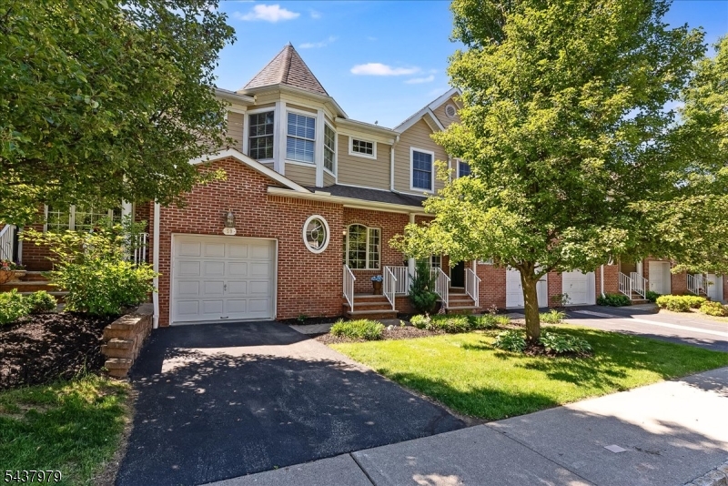 Welcome to effortless living in Round Top, one of Sparta's most desirable townhome communities! Perfectly positioned close to downtown Sparta and only minutes from Route 15, this beautifully styled townhome offers the ideal blend of convenience, comfort, and charm. Step inside to find gleaming hardwood floors flowing throughout the main level and an easy, open layout designed for both everyday living and entertaining. The inviting living room leads to a spacious family room featuring a cozy wood-burning fireplace and seamless connection to the kitchen. Just beyond, step out onto the deck, perfect for morning coffee or relaxing evenings outdoors. A beautifully renovated powder room and convenient first-floor laundry complete the main level. Upstairs, the oversized primary suite is a true retreat, offering abundant space for a sitting area, stunning new accent wallpaper, two walk-in closets, and a private bath complete with a soaking tub. Two additional generously sized bedrooms and a full hall bath provide plenty of flexibility. Move-in ready and impeccably maintained, this exceptional home combines stylish updates with a location that simply can't be beat. The large unfinished basement offers storage and endless possibilities. Whether you envision a future recreation room, home gym, media space, workshop, or simply appreciate having room to grow, this expansive lower level provides a blank canvas ready for your ideas.
