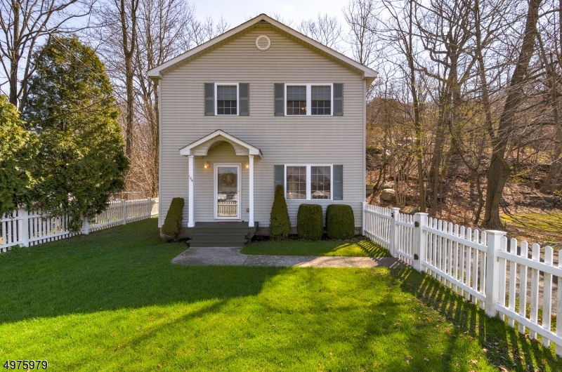 3 BEDROOM, 2 1/2 BATH COLONIAL WITH YEAR ROUND WATER VIEWS!! CONVENIENTLY LOCATED!! Kitchen equipped with granite countertops, an abundance of cabinetry and large pantry. Slider leading to private backyard. Spacious bedrooms, all with ceiling fans. Master bedroom has 4 closets and master bath! Lots of storage throughout. Central Air! Close proximity to some of the the best waterfront dining Lake Hopatcong has to offer! Great spot for commuters, a must see!