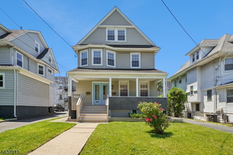 Introducing a fabulous turnkey Two-Family Home renovated in 2021/2. Featuring a two-bedroom and a three-bedroom apartment with separate HVACs, water heaters, and gas & electric metering plus four parking spaces and a welcoming front porch. Located on a low traffic side street with the convenience of a 94 Walk Score. Bloomfield Avenue is only two blocks away and Bay Street train station and Walnut Street, with another train station, restaurants and farmers market, are each .3 mile away. APARTMENT ONE is a duplex with a Private Entrances on the side and in the rear of the building. The first floor has an Eat-in Kitchen, Living/Dining Room with fireplace feature, Large Bedroom w/ two closets and a Full Bath. On the lower level is Bedroom Two w/ a walk-in closet & egress window, a Full Bath, Laundry Room, and Bonus Room. APARTMENT TWO is a triplex. Enter via the front door into a spacious Private Foyer with closet & built-in storage bench. The second floor features the Living Room, Eat-in Kitchen, Primary Bedroom w/ two closets, Bedroom Two, and Full Bath with two vanities and separate shower and tub. On the third floor is Bedroom Three, a Bonus Room ideal for a home office, den, or additional bedroom, a Full Bath and a Laundry Room. With thoughtful renovations, separate utilities, ample parking, and a highly walkable location near transportation, dining, and neighborhood amenities, this property presents an outstanding opportunity for both owner-occupants and investors alike.