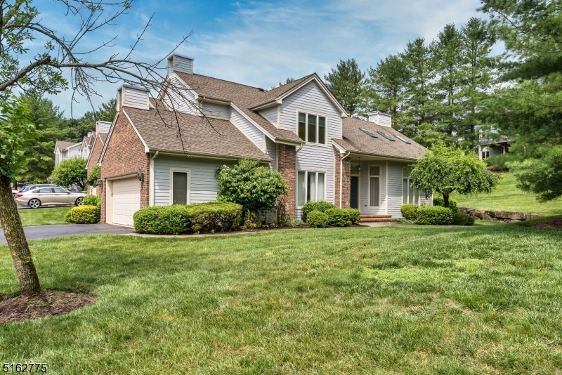 Desirable Sotheby model with the master bedroom on the first floor. Enter into the 2 story entry with wood floors. The bright living room with vaulted ceiling features skylights many windows, recessed lights, gas fireplace and door to a patio. The upgraded kitchen has stainless steel French door refrig, skylights, sink disposal and granite counter and walk-in pantry. At the end of the day relax in the primary br, with vaulted ceiling his and her closets and plantation shutters. On the second level you will enjoy a large loft which can be used as family room. There are two large bedrooms and bath. Additional living space is provided in the recreation room in the basement where you will also find an office, laundry room, bath w shower and an additional room and storage area.
