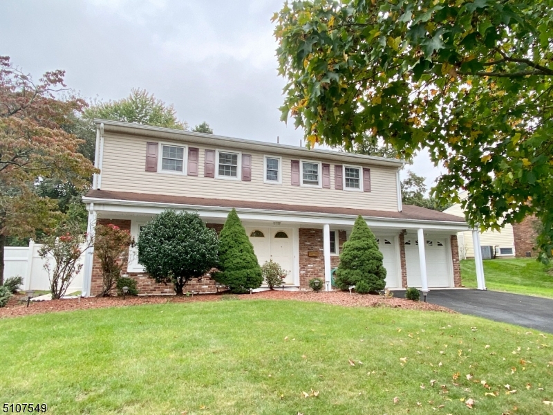 Spacious Colonial/Split level featuring large center hall and open floor plan, eat-in kitchen with marble floor, stainless steel appliances, wall oven, and breakfast bar.  On the ground level are a family room, powder room, dining room, and kitchen. The family room's sliding doors lead to patio and large fenced-in yard.  Close to major highways, trains/buses to NYC, Rutgers University, New Brunswick Performing Arts Center, and top-rated medical facilities. Minutes to Colonial, Buccleuch & D&R Canal State Parks.