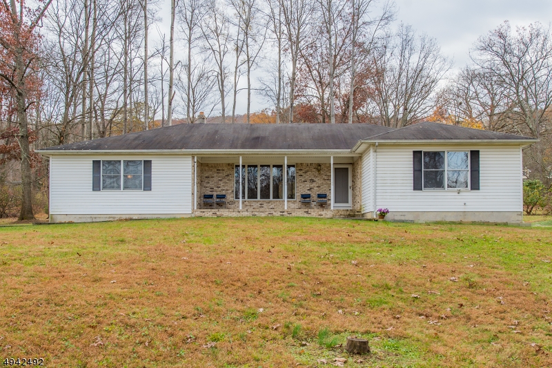 Desirable one floor living - ranch home w/ covered front porch, park-like setting, large bedrooms, huge unfinished basement, perfect for finishing, 2 car garage, newer flooring, Wshington Twp. schools Minutes to shopping and dining in Hackettstown.  Convenient location!