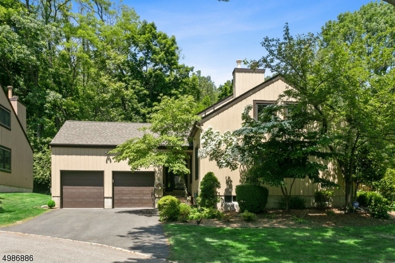 Stand-alone house in sought after Harding Green on .51 acres w/ association maintenance. Designer?s own home completely renovated for open floor plan & entertaining. Cooks kitchen w/ Thermador pro range & Liebherr refrig. Beverage center. Calcutta marble brick backsplash compliments the white Quartzite countertops. Cathedral ceiling in Living Room & skylights add to open airy feeling. Brazilian Cherry flooring & architectural moldings add interest to the large family room. Possible 1st floor master w/ private bath & jetted tub. Sound system thru-out 1st floor & deck. Second floor has large vaulted ceiling bedroom-2 w-i-closets lofted sitting room & newer luxury MBA. Radiant flooring kitchen & 2 bathrooms. Abundant storage. Walk in attic & finished lower level with bedroom, office area, full bath &