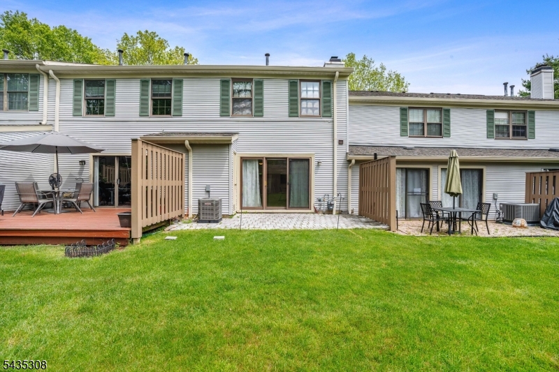 Welcome to this beautifully updated townhouse in the sought-after Society Hill community of Basking Ridge. This bright and sun-filled 2-bedroom, 2.5-bath home features a fully remodeled kitchen, brand-new vinyl flooring, and fresh paint throughout, offering a modern, move-in-ready feel.  The open-concept living and dining areas flow seamlessly to a private patio, perfect for relaxing or entertaining. Upstairs, both spacious bedrooms offer en-suite baths, along with the convenience of second-floor laundry.  Enjoy low-maintenance living with access to community amenities, including a pool, tennis courts, clubhouse, and walking paths. Ideally located near major highways, NJ Transit, shopping, dining, and within the top-rated Bernards Township school district.  A perfect blend of comfort, style, and location A MUST SEE!