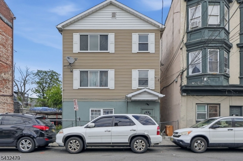 Rare opportunity! This stylish apartment offers 3 spacious bedrooms and 2 beautifully updated bathrooms, designed for both comfort and everyday living. A fenced front yard for added privacy.  Separate utilities, updated interiors and close to Route 80, Route 20, and NJ Transit. Located near transportation, shopping corridors, laundromats and schools. Situated in Paterson East side redevelopment district.