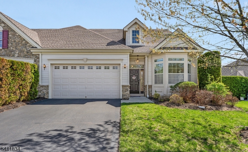 WELCOME TO THIS BEAUTIFUL RANCH STYLE HOME LOCATED IN THE DESIREABLE DELAWARE CROSSING 55+ ADULT COMMUNITY. This wonderful home is flooded w/natural light. The home consists of 2 bedrooms and 2 full baths. The flooring in this home has been recently installed and the interior has been freshly painted. There is a dining area overlooking the large living room with sliders to access your private patio. A great place to sit back and enjoy your morning coffee. There are high ceilings and large windows throughout.  The Primary bedroom features a tray ceiling, plenty of closet space and a primary bath with shower and separate soaking tub. The 2nd bedroom can be utilized as an office.  The home also has a washer and dryer for your convenience complete with a two car garage. Delaware Crossing Community offers an active lifestyle with amenities such as a clubhouse, heated pool, fitness center, sports courts, and bocce ball.   Located only minutes to Rte. 57 + 22.  There are medical facilities, shopping, and dining just minutes away.