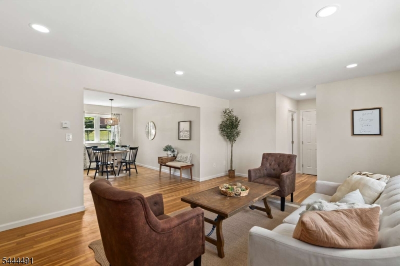 This beautifully renovated second-floor 1-bedroom, 1-bath condo features a bright, spacious layout with refinished hardwood floors, recessed lighting throughout, and new interior doors and trim work. The renovated kitchen offers modern finishes and ample cabinetry, while the updated bath provides a fresh, contemporary feel. A generously sized bedroom offers abundant closet space, and the thoughtful floor plan is perfect for everyday living and entertaining. The unit also includes one assigned parking space (#127), a private storage unit, on-site laundry, and ample guest parking. Enjoy resort-style amenities including a clubhouse, fitness center, outdoor pool, tennis courts, beautifully landscaped grounds, and professional on-site management. The HOA covers heat, gas, water, sewer, garbage, snow removal, maintenance of common areas, and access to all community amenities, making ownership truly hassle-free. Ideally located with easy access to Routes 10, 46, 80, and 287, plus shopping, dining, and NYC transportation, this home is perfect for commuters. Hurry...this one will not last!