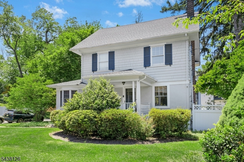 Beautiful quintessential charming Westfield colonial on a prime corner lot presents an exceptional opportunity to own a classic Westfield home, conveniently located near local parks, all 3 schools (elementary, middle AND high school), & Westfield's vibrant downtown. Offering 4 bedrooms, 2 full & 2 half baths, this property perfectly combines historic architectural charm with a practical layout. The main level welcomes you with a warm living room where natural light highlights the home's character. Enjoy a seamless, open flow from the living space into the formal dining room & straight through to the kitchen, creating an ideal setup for daily living. A 1st level powder room offers further convenience, & a large flexible bonus den/office complete the 1st floor. The 2nd level features 3 generous bedrooms, a full hallway bath, & an additional room ideal for a 2nd home office. Escape to the private 3rd level primary retreat complete with an en suite bathroom with dual vanities. The partially finished basement boasts a spacious rec room & laundry space, as well as  plentiful storage options, & an additional powder room. The detached garage has entry on the side street of this corner lot, offering daily ease and practicality. The backyard & patio are private, level, and ideal for both entertainment and relaxation. This classic Westfield gem is full of charm, character, and functionality.