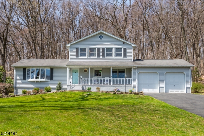 Sun Filled Updated Colonial with Front Porch in Shongum Lake, backing up to Park Land! This beautiful home features updated Kitchen and Baths, Hardwood floors throughout, and Newly updated finished basement. A NEW 4BR septic was installed in 2018. Walk to the lake or the Randolph Trails from this location. The Shongum Lake community features a clubhouse, beach, boating, swimming, and a full calendar of social events & clubs. Award Winning Randolph Schools. Close to highways & public transportation. Enjoy year round activities in this premier and sought after neighborhood!