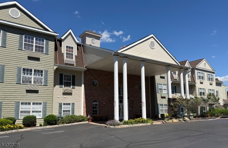 Welcome to Bald Eagle Commons, West Milford's most sought-after 55+ community. This beautifully maintained 2-bedroom, 2-bath Greenbriarunit offers 1,273 square feet of comfortable, single-floor living designed with both function and ease in mind. Step inside to find a bright and spaciouslayout featuring a formal dining room, a generous living room perfect for relaxing or entertaining, and an eat-in kitchen with ample cabinet and counterspace. The primary suite is a true retreat, complete with a large walk-in closet and a private full bath. A second bedroom and full bath offer flexibility forguests, a home office, or whatever suits your lifestyle. In-unit washer and dryer included. Located in Building 5 with convenient elevator access, this unitincludes a dedicated parking space conveniently located near the front door, plus a large storage cage for all your extras. Snow removal from your car inwinter is just one of the thoughtful perks this community offers. Residents enjoy an impressive array of amenities including an outdoor pool, clubhouse,tennis and pickleball courts, bocce, shuffleboard, jogging paths, and a full social calendar. Each building features its own library, card room, and partyspace, so there is always something to do right at your doorstep. This is low-maintenance living at its finest, in a vibrant community that truly has it all !  Plus a Prime parking spot!! Come  see why people love calling Bald Eagle Commons home.