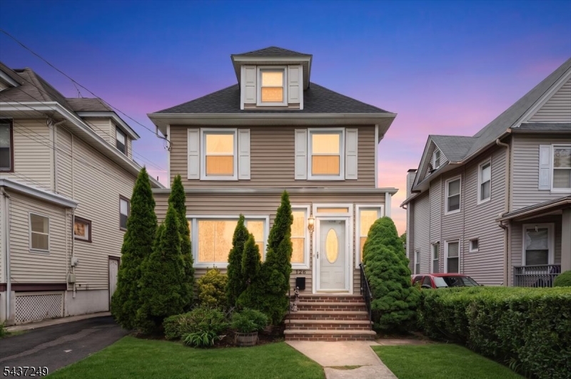 Welcome to 126 Berwyn Street, Roselle Park, NJ! This beautifully maintained home offers 3 bedrooms, 1.5 bathrooms, and a finished walk-up attic, providing flexible space for a home office, recreation room, or additional living area.Come inside through the inviting foyer and appreciate the high ceilings, crown molding, and hardwood floors that add warmth and character throughout the main level. The updated kitchen features a pantry for added storage and convenience, making meal preparation and entertaining a breeze.Enclosed front area.  Unwind on the covered rear deck overlooking the backyard. Additional features include a detached garage, unfinished basement with plenty of storage space, and included area rugs.Major improvements include a newer roof, furnace  and central air conditioning , offering added peace of mind. All with 3 to 5 years.I The second floor windows are newer.  Ideally located near schools, parks, shopping, restaurants, downtown Roselle Park, and NJ Transit train service, this home offers convenience, charm, and commuter-friendly access.Don't miss the opportunity to make this wonderful Roselle Park property your next home!