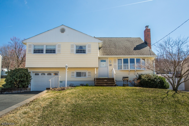 Split Level w/Tremendous Possibility! Beautiful home located in quiet Birchwood Section of Rockaway Twp. Shows pride of ownership. Lovingly cared for 50+ years. ORIGINAL OWNERS! Lots of Generous Room Sizes to Spread Out & Make Your Own! Beautiful HW Floors Throughout. Bright & Sunny living space. Open LR w/oversized picture window, DR, Large Kitchen & Bonus Den area. 3 BDRMs & full bath upstairs. Oversized Master w/ensuite on 3rd Floor. FR, laundry & garage access on lower level. Plenty of storage space in attic, 1 car garage & shed. Backyard is a DREAM w/ covered patio. An ideal spot to relax & enjoy life. Beautiful tree-lined street w/ sidewalks & curbs. Nice location just 5 mins from Rockaway Mall. Close prox to schools, mass transportation, hwys, & shopping. Easy commute to NYC! C/A & Public Utilities!