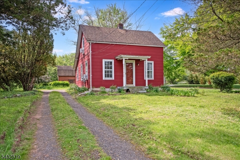 Set on 3.3 picturesque acres in desirable Basking Ridge, this simple and charming 2-bedroom cottage offers a rare opportunity to create the lifestyle you've always envisioned. Nestled on a beautiful level and wooded property, this hidden gem is ready for its next chapter   whether you choose to renovate, expand, or build your dream retreat from the ground up.Perfectly positioned directly across from the VA Golf Course and just a short stroll to Pleasant Valley Park, residents can enjoy an active outdoor lifestyle with walking trails, sports fields, and popular pickleball courts just moments away. Commuters will appreciate the unbeatable convenience to Routes 78 and 287, along with nearby NJ Transit rail service offering direct access to Penn Station and Hoboken.With public water/sewer already in place, award-winning schools, and sought-after local destinations including the Great Swamp Wildlife Refuge and Lord Stirling Park & Stables, this property combines natural beauty, exceptional location, and endless potential. Bring your imagination and transform this special Basking Ridge property into something truly extraordinary.