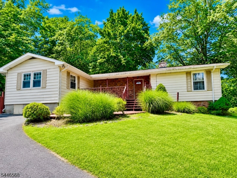 Welcome to this deceptively spacious home located in the desirable Alpine section of Lake Mohawk! Much larger than it appears from the outside, this versatile home offers three bedrooms, two full baths, plus  two additional rooms that could potentially be used as extra bedrooms, guest rooms, or flex space to suit your needs. The large, open basement provides even more possibilities for recreation, storage, a home gym, or future finishing. Offering plenty of room to spread out and a flexible layout, this Lake Mohawk home is full of potential and ready for its next owner!