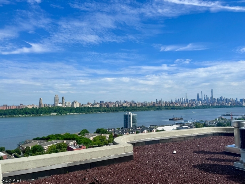 An exceptional opportunity to own one of Carlyle Towers' most coveted residences. This Magnificent corner home- one of the largest 2 bedroom, 2.5 bath condominium in the building --offers 1,636 sq ft of refined living space, complemented by a sprawling 153- sq ft private terrace. (as per Carlyle Towers floor plan) Bathed in natural light from this desirable Southeast exposure, the residence frames breathtaking unobstructed views of the New York City Skyline and the Hudson River. Both Bedrooms feature a luxurious en-suite bath, while the thoughtful layout provides an elegant separation of living and private spaces. In-unit laundry adds an additional layer of convenience to daily living. Carlyle Towers delivers a White-glove lifestyle befitting the most discerning buyer. Residents enjoy 24-hour concierge and doorman service, valet parking, and One car garage parking included, with additional spaces available, a resort-style outdoor pool, and a state-of-the-art fitness center. There is a children's playground and playroom, library, drycleaner and private event space for effortless entertaining year-round. The building provides easy access to major New York City transportation, the George Washington Bridge and the Lincoln Tunnel- placing Manhattan close by. The J line residence is Rarely available. Not to be missed! A must see!