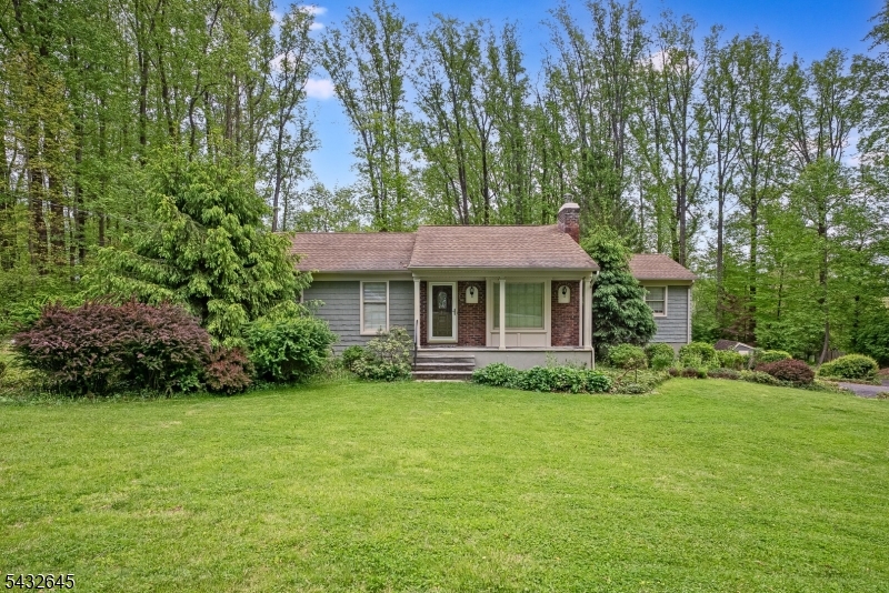 Set on a beautiful 1.49-acre lot in Chester, this 4-bedroom, 2.5 -bath ranch has the space, layout, and setting buyers are looking for. The home offers a comfortable one-floor floor plan with generous room sizes, two fireplaces, an eat-in kitchen, formal dining room, and multiple living areas that give everyone room to spread out. The enclosed porch is a great spot to enjoy the peaceful backyard, and the walk-out unfinished basement offers plenty of storage or the chance to create even more usable space. Outside, the circular driveway, attached 2-car garage, and private setting add to the appeal. Close to downtown Chester, local parks, shops, restaurants, and commuter routes, this is a great opportunity to make a home in one of Morris County?s most sought-after areas.