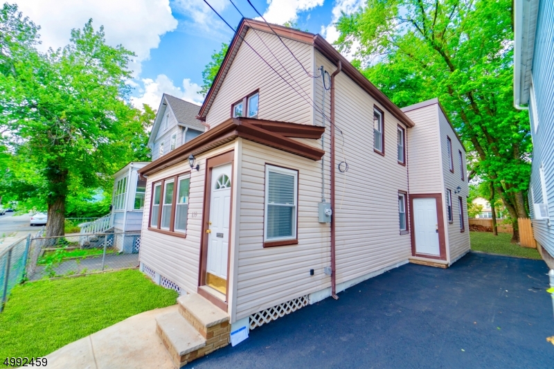 Beautifully renovated colonial feature finished enclosed porch for all seasons enjoyment, open concept living room/dining room, updated kitchen cabinetry, stainless steel appliances. Generously sized bedrooms.Hardwood floors throughout. freshly painted inside & out, recessed lighting. Finished Basement with lots of space. New, Roof, New HCVAC system, new windows, laundry room, New paved driveway exclusive. The yard is fence and ready for summer entertainment. Low taxes. Minutes away from Seton Hall University.