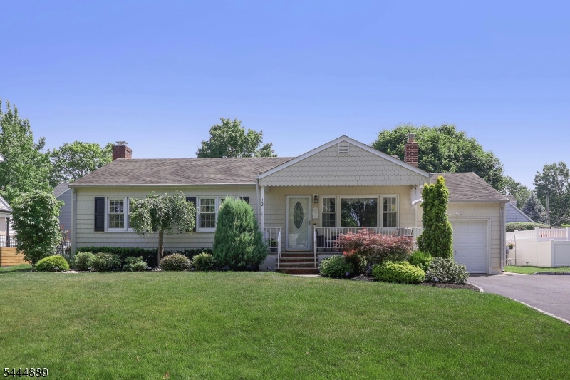 Welcome to 12 Whitley Terrace in Clark, New Jersey a beautifully renovated ranch-style home offering one-floor living, an open-concept layout, and exceptional living space both inside and out. This highly desirable 3-bedroom, 2.5-bath home features soaring cathedral ceilings and a spacious open floor plan designed for today's lifestyle. The bright and inviting interior includes separate formal living and dining rooms, providing flexible spaces for entertaining, holiday gatherings, and everyday living. The updated layout flows seamlessly throughout the home, creating an airy and comfortable atmosphere. The fully finished basement adds substantial living space and includes a large recreation room perfect for a home theater, game room, fitness area, or playroom. A dedicated workshop provides an ideal space for hobbies, projects, or storage, while additional crawl space and attic storage offer plenty of room to keep belongings organized. Step outside to enjoy the expansive, level backyard perfect for outdoor entertaining, gardening, recreation, or future customization. The paver patio creates an inviting outdoor living area for summer barbecues and relaxing evenings. Located in a desirable Clark neighborhood close to parks, shopping, dining, major highways, and public transportation, this move-in-ready ranch combines comfort, functionality, and modern updates. Don't miss this opportunity to own a beautifully renovated home in one of Union County's most sought-after communities.