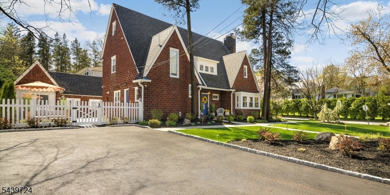 WELCOME HOME to this renovated one family home, in the desirable town of Leonia.Large corner property with parklike landscaping and a renovated cottage with A/C and electric in the backyard (can be used as a gym, studio or home office). This home comes with 4 bedrooms, 3 1/2 baths, parking for 4 cars, fenced in/private backyard, water purification system and so much more. On the first floor, you will enjoy a large living room filled with natural light, fireplace and an adjacent sunroom (that can be used as home office), beautiful hardwood floors throughout plus a half bath. A gourmet kitchen, equipped with top-of-the-line new appliances and an inviting dining room. The second level is complete with 3 expansive bedrooms, large closets, 2 baths, including a primary suite with an in-suite spa-like bathroom with heated floors and climate control in each bedroom. On the third floor, you will find a beautiful finished open space with hardwood floors & a full bath for extra living space. With over 2,700 Sq.Ft of living space, central A/C, security system, water filtration system, new electric/plumbing, generator and sprinkler, this home has it all! Leonia is known for it's top rated schools and prime commuter location.Enjoy an easy commute to NYC (bus stop steps away) and easy access major highways. A MUST SEE! Call today for a tour!