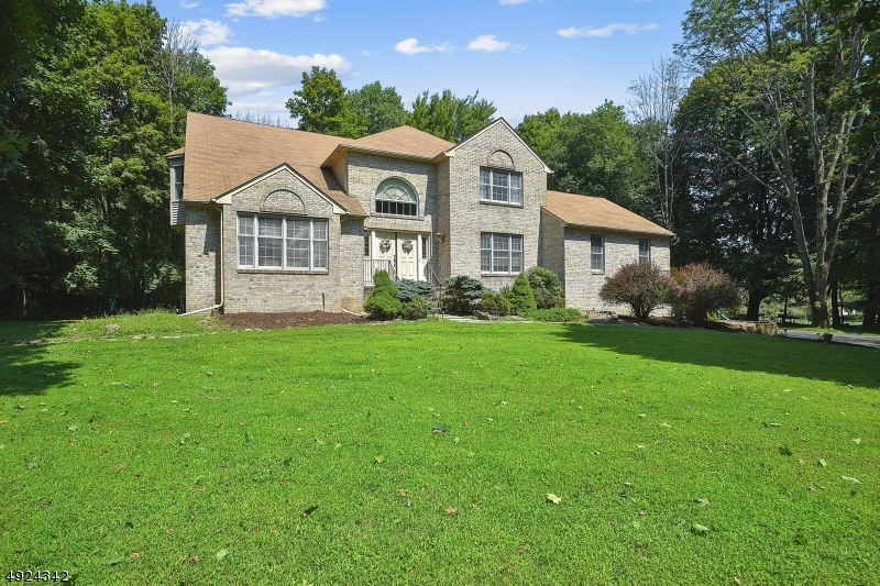 Stunning Colonial set back on 1.25 acres of park-like property in Randolph. Convenient location to schools, parks, major highways & shopping. This spacious home is ideal for entertaining w/ large rooms, hardwood & ceramic floors. An elegant 2 story foyer w/ Palladian arch window opens to sunken LR w/ vaulted ceiling & large picture window, and formal DR. Over-sized gourmet kitchen feat SS appliances, granite counters, pantry, & sun-drenched breakfast area w/ sliders to deck, flowing to the fam rm w/ wood-burning fireplace. An office/bonus rm, full bath & laundry rm complete this floor. The 2nd floor includes light & bright master suite w/ walk-in closet & sumptuous master bath w/ jetted tub, along w/ 3 additional bedrooms & bath. Finished basement offers plenty of living space & large storage area.