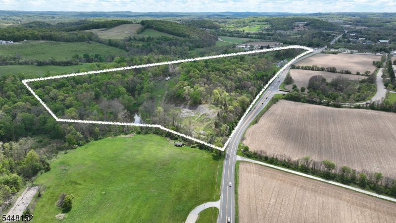 This well situated vast 62+ acre property boasts very high visibility from both Rt 15 and Rt 565 and is near the junction of Rt 206 providing excellent public facings---The property is also situated across from Skylands Stadium which hosts concerts and events as well as being the home of the Sussex Miners Baseball Team who are a part of the Frontier League - a designated MLB Partner League---There is approximately 600 feet of visibility along Rt 15 and 2400 feet of road frontage along Rt 565---Current owner improved the property by clearing portions of the land and creating a system of roads for access---he entire property was recently reclassified as CED2 zoning which allows a number of commercial uses---Note - Survey shows partial AR zoning, which has since been reclassified as all CED2 Zoning---In addition to the land, there are several barns including a large dairy barn that can be repurposed (approximately 6000 SF) and a currently rented 3 BR home that yields a rental income to cover taxes/carrying costs---. With a consistently upward shifting demographic of new home owners and businesses moving to Sussex County over the past few years, this opportunity to develop a visible commercial project should appeal to any investor looking to add to their portfolio.