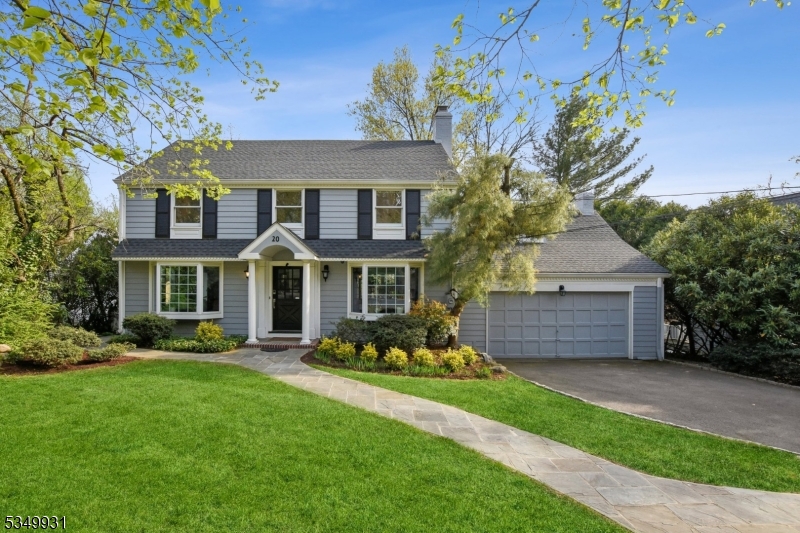 This home has it all! Location, quality, craftsmanship, space & a very large level oversized property! It is incredibly rare to find a home of this quality & caliber. Sophisticated modern colonial with 5 sunny, spacious BRs, 3 full & 2 half baths. Fine residence features an open-concept floor plan which flows effortlessly. Gracious front-to-back foyer flanked by a sun-filled LR with fireplace & an elegant DR. The bright family room with floor to ceiling windows overlooks the large, serene property & opens onto the multi-tiered decks. A stunning gourmet kitchen offers sleek white cabinets, Viking, Wolf & Miele appliances, quartz counters, marble backsplash, oversized center island, custom bar, sun drenched breakfast area & pantry cupboard. 2nd level has 4 spacious BRs & 3 baths. The. luxurious primary suite has oversized windows, walk-in closet & a spa-like tumbled marble bath with a double vanity & glass shower. An amazing finished walk out lower level adds exceptional versatility & a whole extra level of living space, featuring a large rec room, second kitchen, powder room, office, laundry & tons of storage. French doors open to a bluestone patio & large, level, tranquil backyard surrounded by flowering trees & space for a pool. Gleaming hardwood floors, recessed lights, upgraded electrical, a new HVAC system, high-end finishes throughout, two-car attached garage & mudroom. Premier location, 3 minutes to train station, downtown & top-ranked Millburn Schools