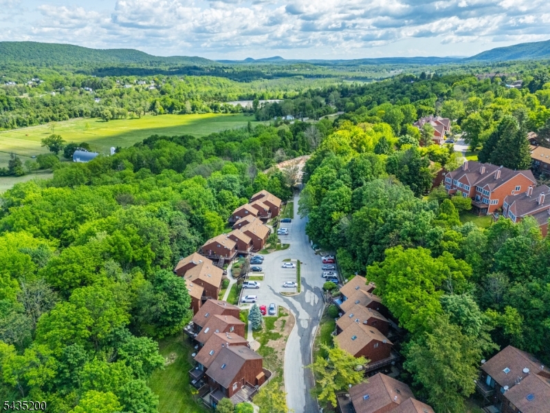 Very desirable 2-bedroom townhouse in Great Gorge Village! This must-see condo features a beautifully updated bathroom, an open floor plan, and a private deck off the living/dining area perfect for relaxing or entertaining. Enjoy all the amenities and outdoor activities this sought-after community has to offer! Enjoy an unbeatable location just moments from the ski slopes, pool, and playground. Nearby amenities include the Minerals Spa & Fitness Club, water park, golf courses, hiking trails, horseback riding, and more. Conveniently located approximately 60 miles from NYC and just 10 miles from Warwick, NY, making it the perfect getaway or year-round residence.