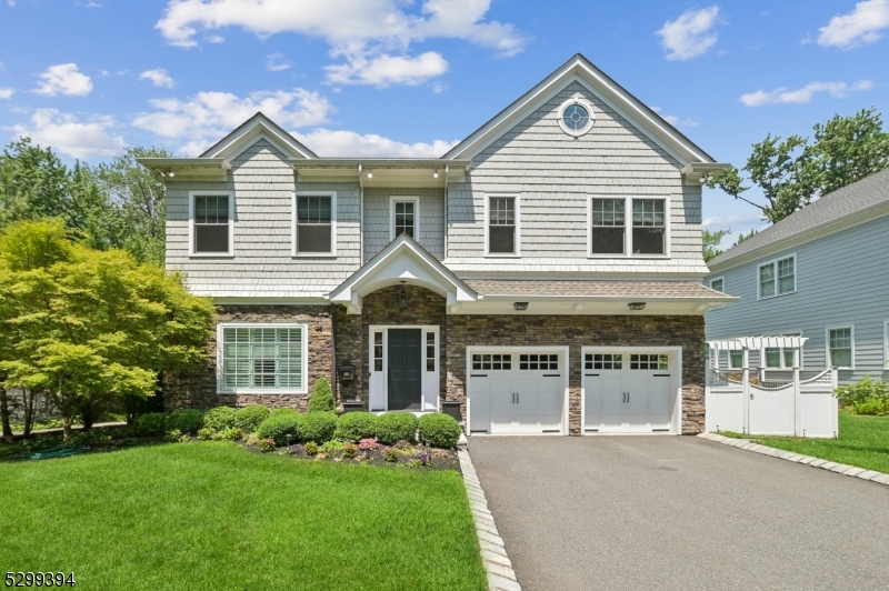 Welcome home to this bright and spacious newer custom colonial! This stylish masterpiece features 5 gorgeous bedrooms, 4.1 bathrooms, a dreamy expansive primary bedroom walk-in closet, large rec room in the finished basement, impressive open floor plan, and 2 car attached garage. The breathtaking details and finishes provide luxury living in the desirable Glenwood section of Short Hills. Additional features include high ceilings, an eat-in kitchen overlooking the great room, formal dining room, hardwood floors, chef?s kitchen, wine fridge, marble counters, spa-like bathroom with soaking tub, and dual vanities. Your outdoor amenities include a deck and huge yard with two separate areas created for privacy as well as fun backyard activities!