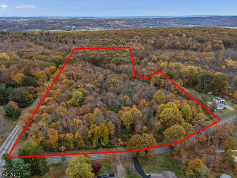Prime Development Opportunity in Morris County - Two Lots - Block 25 Lot 56.05 and Block 56.06, total combined acreage 35.5 ac. - Nestled in the heart of Morris County, this exceptional parcel offers a rare blend of strategic location, natural beauty, and development potential. Bordering the scenic Schooley's Mountain Park and within close reach of Budd Lake and nearby state parks, the property is surrounded by a desirable residential community and abundant recreational amenities. Outdoor Lifestyle & Recreation - Direct access to Schooley's Mountain Park trails and the Patriots Path Trail. Minutes from Minebrook and Black Oak Golf Courses for golf enthusiasts. Unbeatable Location - Centrally positioned with easy access to Hunterdon, Somerset, and Warren Counties. Convenient to Long Valley, Chester, Hackettstown and Washington offering diverse options for shopping, dining, and cultural events. Education & Culture - Close to Centenary College, a hub for academic and cultural enrichment. Whether you're envisioning a residential enclave, recreational retreat, or investment venture, this property delivers the perfect canvas. Reach out today to explore its full potential.