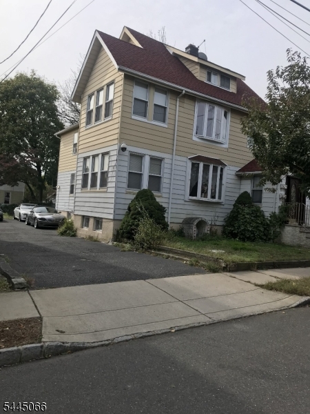 Newer kitchen w cherry cabinets, granite tops w center island. Stainless steel chef stove + microwave. All new European flooring through out. Beautiful bay windows. Utilities included in rent!!! Large 5 room apartment. 2 off street parking spaces.